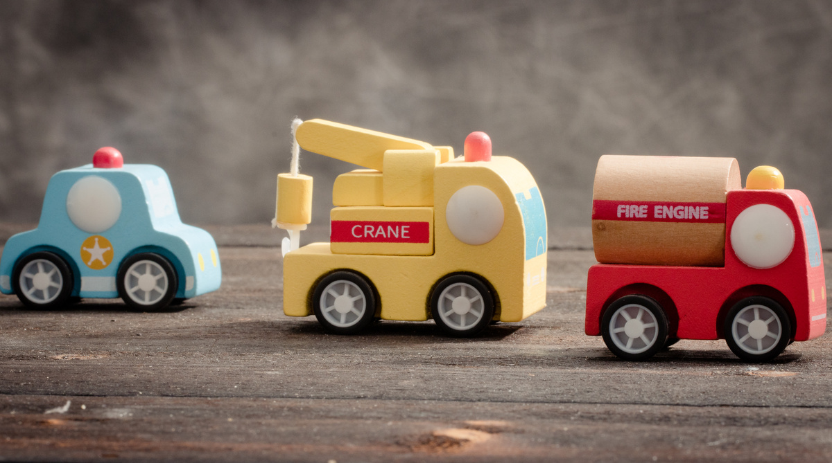 Toy Cars on a Wooden Surface
